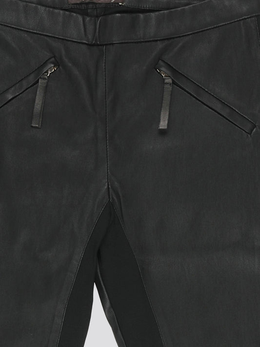 Step out in style and confidence with these Black Slim Fit Leather Pants from Roberto Cavalli. Crafted from buttery soft leather, these pants hug your curves in all the right places for a sleek and sexy silhouette. Whether you're heading out for a night on the town or simply want to elevate your everyday look, these pants are sure to make a bold statement.