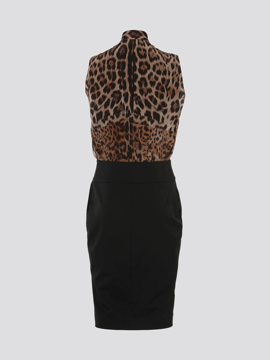 Step into the wild side with this bold and elegant Leopard Print Sleeveless Dress by Roberto Cavalli. The stunning design is perfect for making a statement at any special occasion or night out. Embrace your inner fierce and fabulous with this luxurious and eye-catching piece from one of the most renowned fashion houses in the world.