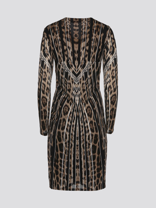 Step into the wild side with our Roberto Cavalli Leopard Print Long Sleeve Dress! This stunning statement piece features a fierce leopard print design that is sure to turn heads wherever you go. Made with high-quality materials, this dress embodies luxury and sophistication, making it the perfect choice for any stylish fashionista. Dress to impress and unleash your inner feline with this captivating Leopard Print Long Sleeve Dress from Roberto Cavalli.