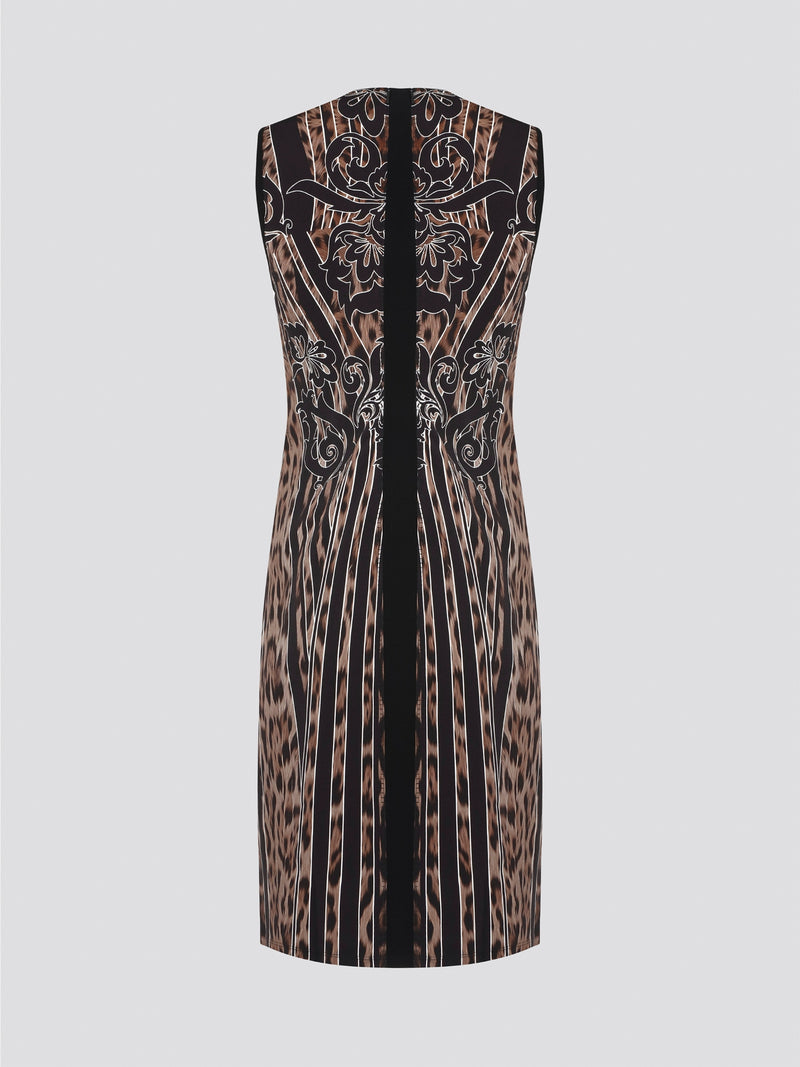 Fade into the wild with the Roberto Cavalli Leopard Print Sheath Dress. This fierce and fabulous statement piece will turn heads wherever you go, exuding confidence and sophistication. Embrace your inner predator and unleash your stylish prowess with this bold and daring dress.
