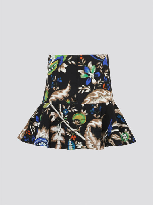 Feel fabulous and fierce in the Foliage Flared Mini Skirt by Roberto Cavalli, designed to make a statement with its bold, botanical print. This mini skirt is perfect for adding a touch of drama to your wardrobe, with its flirty flared silhouette that will have heads turning wherever you go. Embrace your inner wild side and elevate your style with this show-stopping piece from Roberto Cavalli.