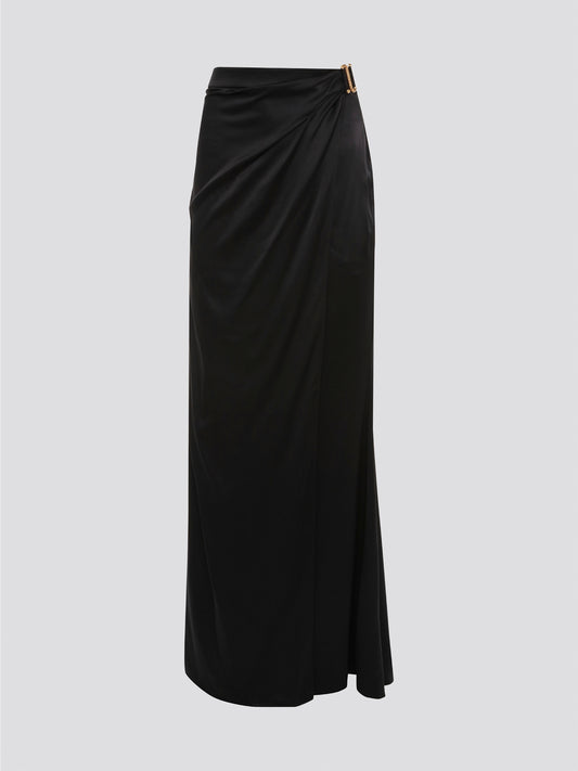 Indulge in effortless sophistication with the Black Draped Maxi Skirt by Roberto Cavalli. Made from luxurious, flowy fabric, this skirt drapes gracefully to create a flattering silhouette that exudes elegance. Whether you're heading to a black-tie event or a casual day out, this skirt will elevate your style with its timeless appeal.
