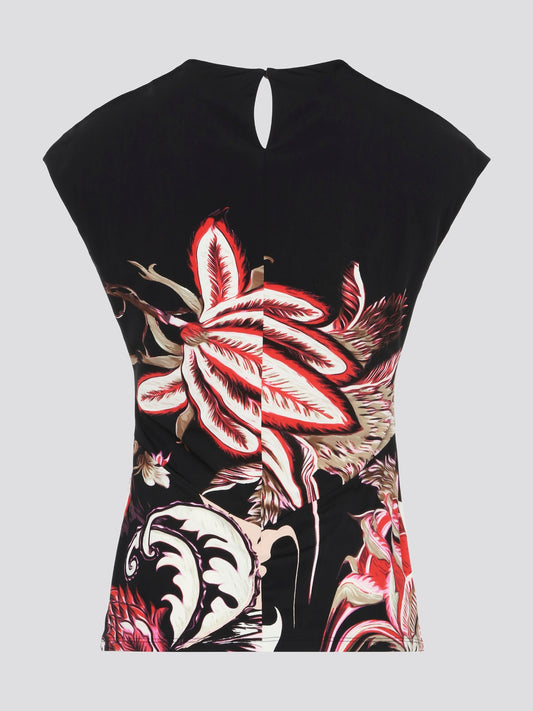Elevate your everyday look with the stunning Foliage Keyhole Top from Roberto Cavalli. This statement piece features vibrant foliage print and a chic keyhole detail at the neckline, adding a touch of elegance to your outfit. Perfect for stepping up your fashion game and turning heads wherever you go.