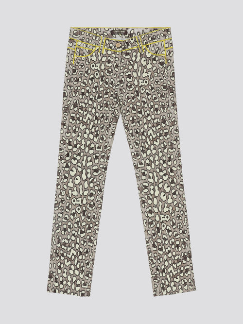 Step into fierce style with these Leopard Print Wide Leg Jeans by Roberto Cavalli. Embrace your wild side with the bold leopard print pattern that is sure to make a statement wherever you go. The wide leg silhouette adds a touch of elegance to these edgy jeans, perfect for a fashion-forward look.