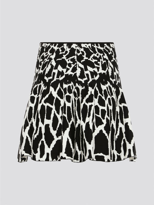 Turn heads with the vibrant and bold Contrast Print Flared Mini Skirt by Roberto Cavalli. The eye-catching design features a mix of geometric patterns and vivid colors, perfect for making a statement. Embrace your playful side and add a touch of luxury to your wardrobe with this unique and stylish piece.