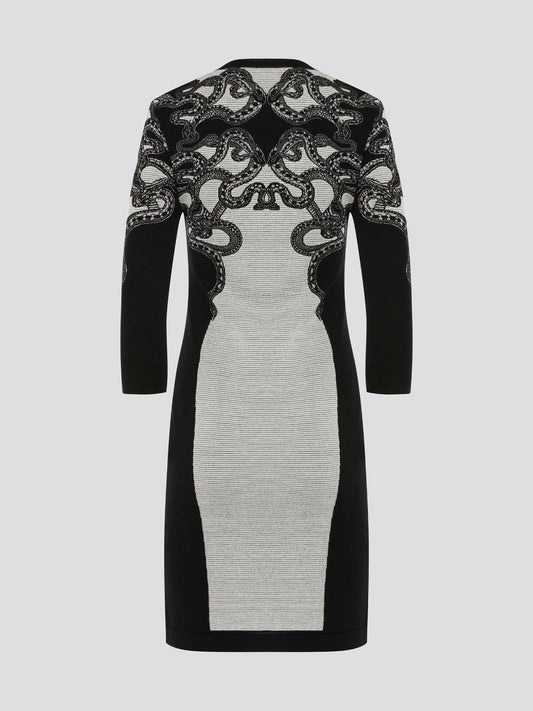 Feel fierce and fabulous in this Roberto Cavalli snake detailed knitted dress. The intricate serpent design adds a touch of exotic glamour to this form-fitting silhouette. Step out in style and make a statement in this one-of-a-kind piece.