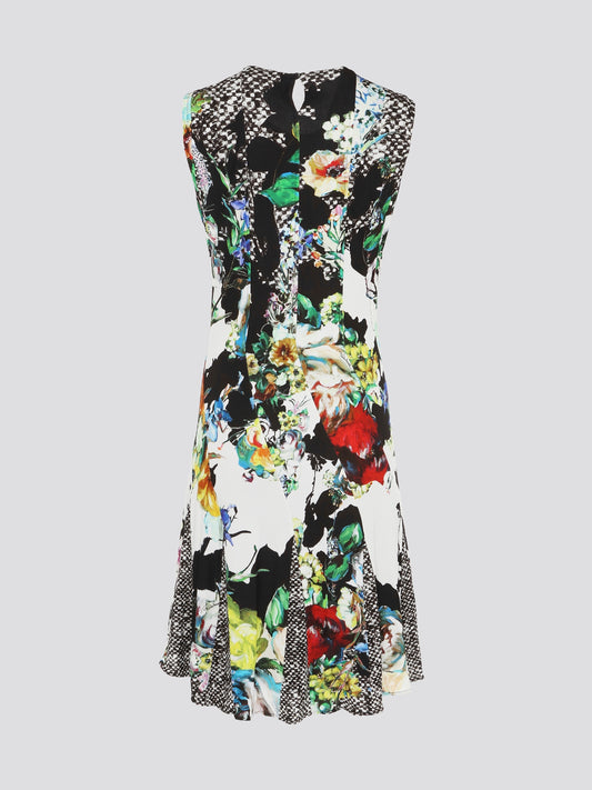 Indulge in the wild beauty of nature with the Foliage Sheath Dress by Roberto Cavalli. This exquisite piece showcases intricate leaf motifs that dance across the fabric, creating a mesmerizing blend of elegance and edge. Perfect for the modern woman who dares to stand out and make a bold fashion statement.