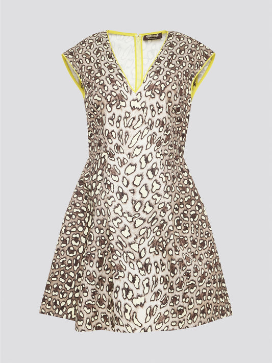 Indulge in your wild side with the Leopard Print V-Neck Mini Dress by Roberto Cavalli, a daring and chic addition to your wardrobe. This statement piece exudes fierce confidence with its bold print and flattering silhouette, perfect for a night out on the town or a special occasion. Channel your inner fashionista and stand out from the crowd in this one-of-a-kind piece by a renowned luxury designer brand.