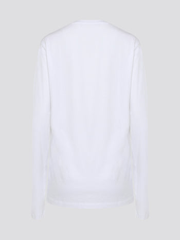 Elevate your wardrobe with the timeless sophistication of the Roberto Cavalli White Printed Long Sleeve Shirt. Made from luxurious, high-quality fabric, this shirt features a captivating print that adds a touch of modern flair to your look. Whether worn casually or dressed up for a night out, this shirt is sure to make a statement and turn heads wherever you go.