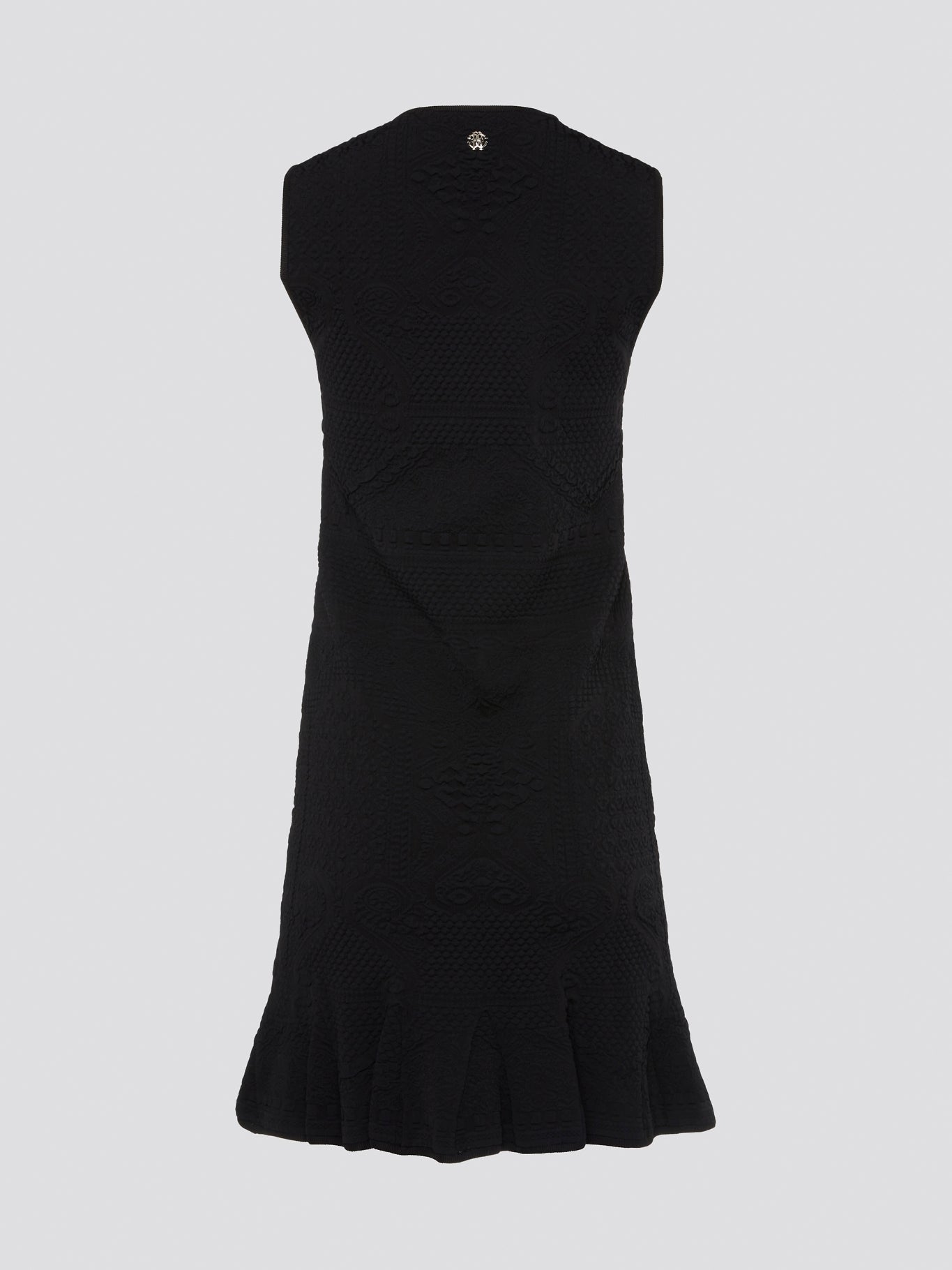 Get ready to turn heads with this stunning black sleeveless mini dress from Roberto Cavalli. This sleek and stylish design features a flattering silhouette that hugs your curves in all the right places. Whether you're hitting the town or attending a special event, this dress is sure to make a statement and elevate your look to the next level.