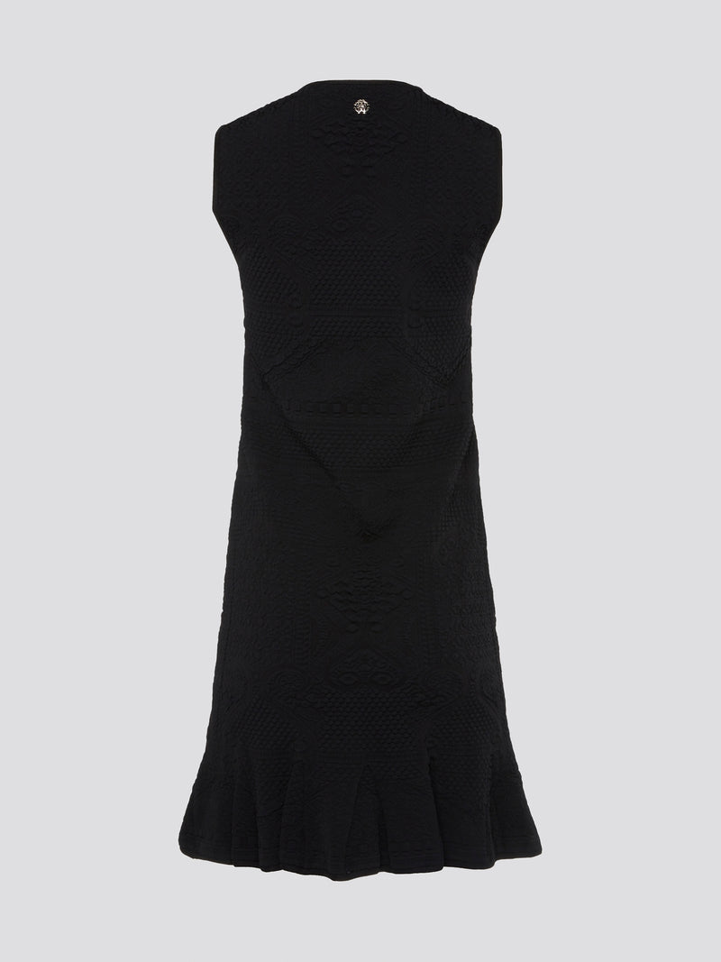 Get ready to turn heads with this stunning black sleeveless mini dress from Roberto Cavalli. This sleek and stylish design features a flattering silhouette that hugs your curves in all the right places. Whether you're hitting the town or attending a special event, this dress is sure to make a statement and elevate your look to the next level.