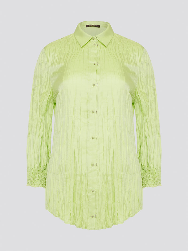 Step into the wild side with this striking green crinkled shirt from Roberto Cavalli. The vibrant hue and unique texture of the fabric will ensure you stand out from the crowd wherever you go. Embrace your fearless fashion sense and unleash your inner style icon with this must-have statement piece.