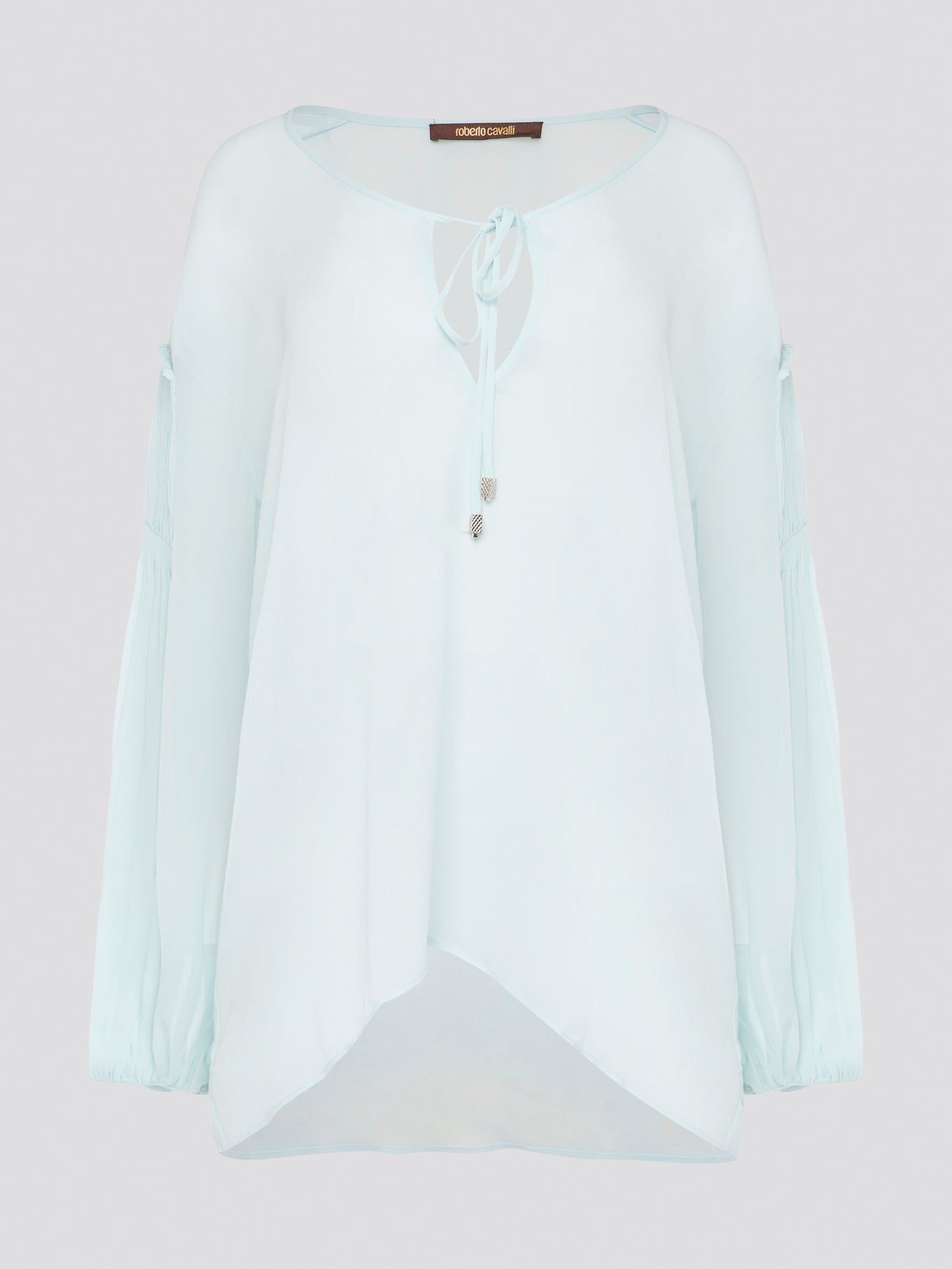 Step up your fashion game with this stunning Mint Green Tie Front Blouse by Roberto Cavalli. The delicate mint green hue and flattering tie front detail will make you stand out in any crowd. Pair it with your favorite jeans for a casual daytime look or dress it up with some sleek trousers for a night out on the town.