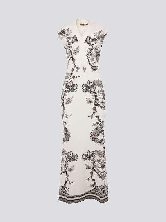 Feel like a goddess in this stunning White Printed Maxi Dress by Roberto Cavalli. The intricate design and flowy silhouette make it an essential piece for any special occasion. Elevate your look with this elegant dress that is sure to turn heads wherever you go.