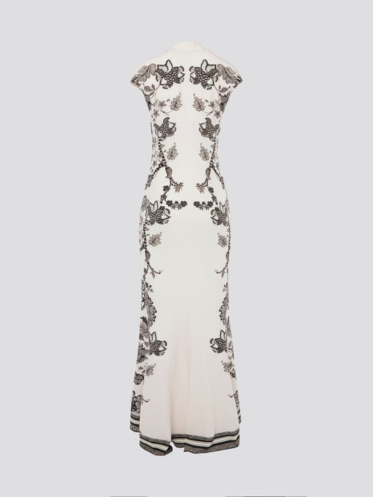 Feel like a goddess in this stunning White Printed Maxi Dress by Roberto Cavalli. The intricate design and flowy silhouette make it an essential piece for any special occasion. Elevate your look with this elegant dress that is sure to turn heads wherever you go.
