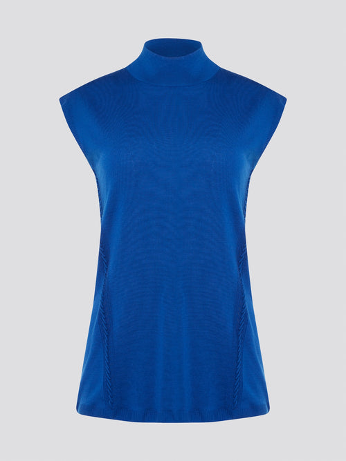 Transform your style with sleek sophistication in this stunning Blue Turtleneck Top by Roberto Cavalli. Crafted with luxurious fabric, this top features a flattering silhouette and eye-catching color that will make you stand out from the crowd. Elevate your wardrobe with this versatile piece that can be dressed up or down for any occasion.