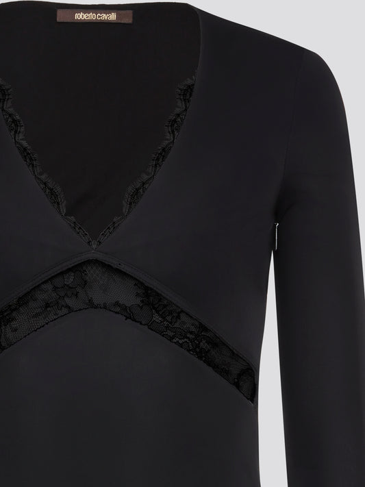 Step into elegance with the Black Lace Panel Top by Roberto Cavalli. This stunning piece features intricate lace detailing that adds a touch of romance to any ensemble. Dress it up with a sleek pencil skirt for a night out or pair it with jeans for a chic daytime look. Elevate your wardrobe with this timeless and versatile top.