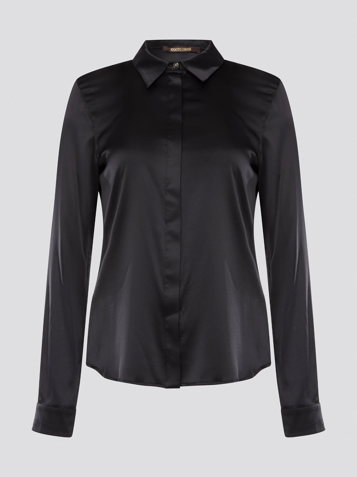 Step out in sleek and sophisticated style with this black satin shirt from Roberto Cavalli, a luxurious addition to your wardrobe. The silky smooth fabric drapes effortlessly, while the tailored fit adds a touch of elegance to any outfit. Perfect for a night out on the town or a special event, this shirt is sure to turn heads and make a statement.
