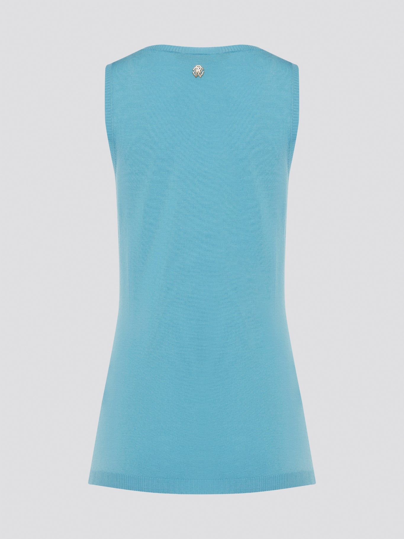 Dive into a sea of luxury with our Blue Sleeveless Top by Roberto Cavalli. Crafted from high-quality materials, this top exudes sophistication and style. Perfect for layering or wearing on its own, this top will elevate any outfit with its stunning blue hue and chic design.