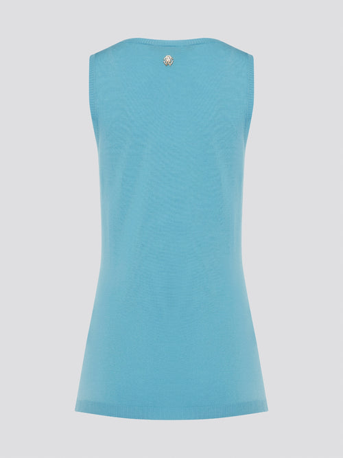 Dive into a sea of luxury with our Blue Sleeveless Top by Roberto Cavalli. Crafted from high-quality materials, this top exudes sophistication and style. Perfect for layering or wearing on its own, this top will elevate any outfit with its stunning blue hue and chic design.