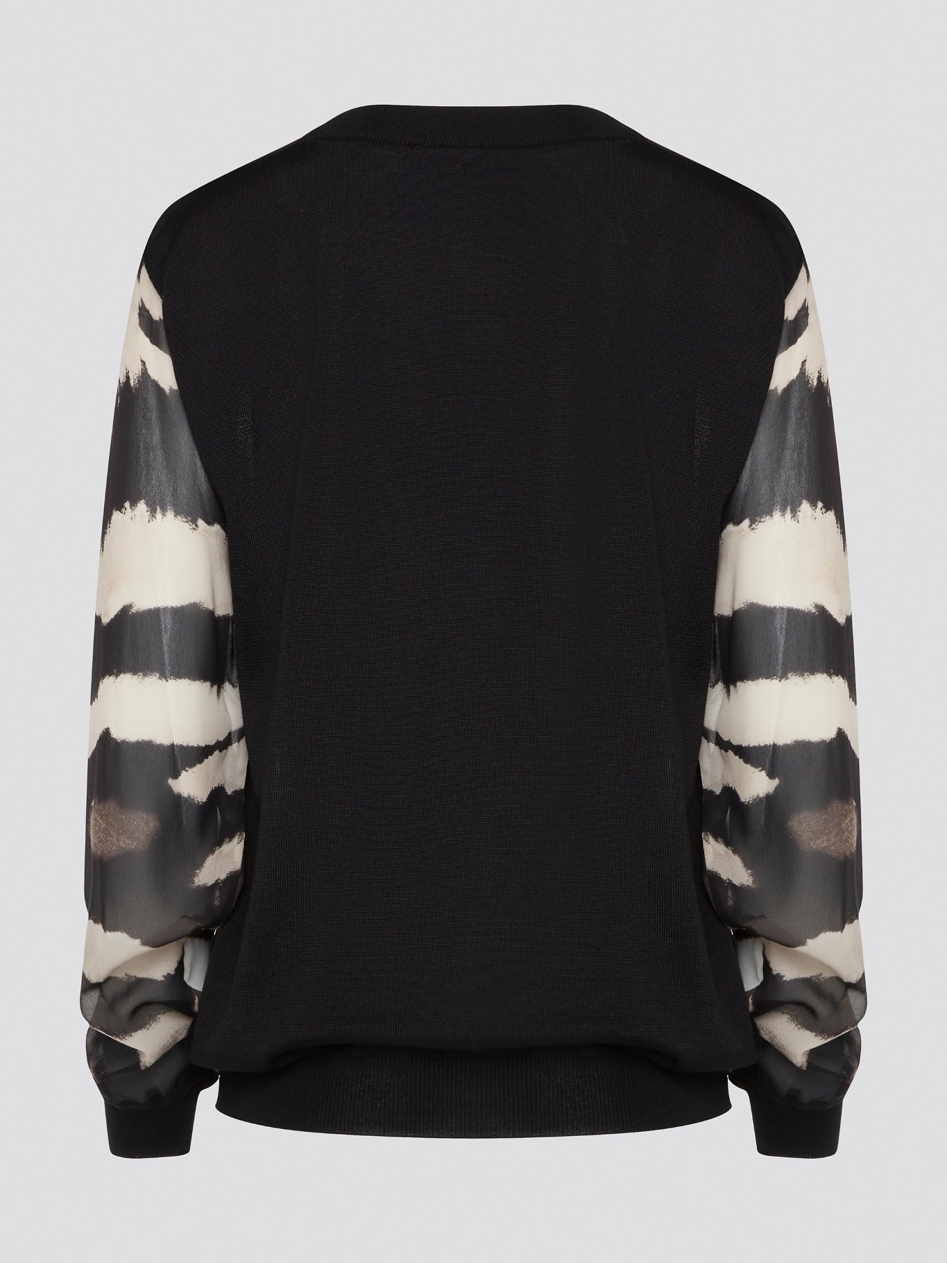 Make a fierce fashion statement with the Roberto Cavalli Zebra Print Sweatshirt, featuring a bold and eye-catching zebra print design. Crafted from premium materials, this sweatshirt offers both style and comfort for all-day wear. Elevate your street style with this standout piece that is sure to turn heads wherever you go.