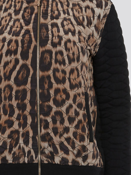Step out in fierce style with the Roberto Cavalli Leopard Print Quilted Jacket. This statement piece features a bold leopard print design that exudes confidence and sophistication. With its quilted construction, this jacket is not only fashionable but also practical for staying warm and stylish all season long.