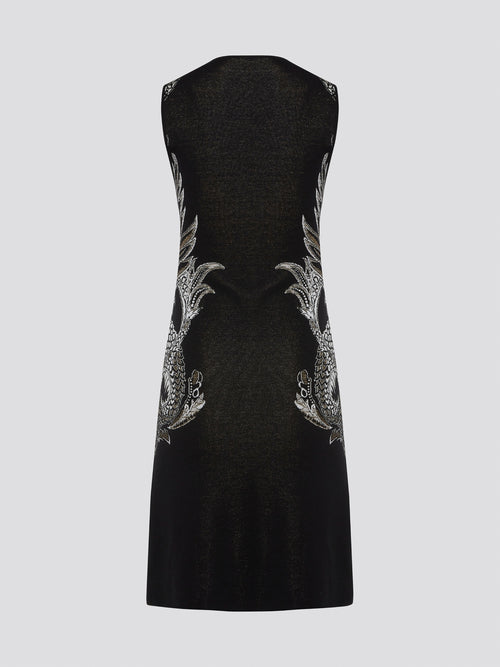 Elevate your wardrobe with the exquisite Knitted Bodycon Dress by Roberto Cavalli. Crafted with precision and care, this dress features intricate knitted details that hug your curves in all the right places. Make a statement at any event with this luxurious and unique piece that exudes elegance and style.