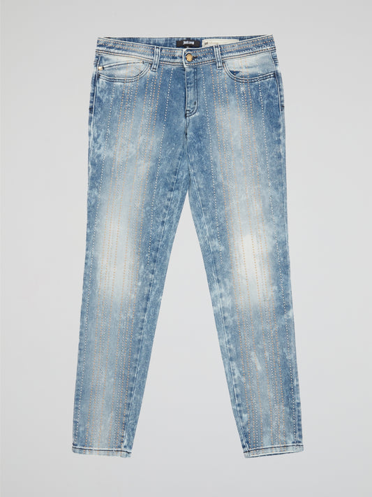 Step out in bold style with these Acid Wash Studded Jeans by Just Cavalli. The acid wash effect adds a touch of vintage cool, while the studded embellishments bring a modern edge to the classic denim design. Perfect for adding an edgy flair to any outfit, these jeans are sure to turn heads wherever you go.