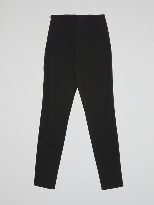 Elevate your wardrobe with these sleek and sophisticated Black High Waist Trousers from Iceberg, perfect for a day at the office or a night out on the town. The high waist design creates a flattering silhouette, while the luxurious fabric ensures all-day comfort and style. Make a statement with these timeless trousers that effortlessly blend elegance and edge.