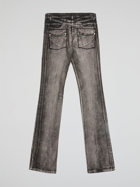 Add a touch of retro glam to your wardrobe with these Grey Acid Wash Flared Jeans by Roberto Cavalli. The unique acid wash design gives these jeans a modern edge, while the flared silhouette adds a hint of 70's flair. Perfect for pairing with a graphic tee and platform heels for a trendy, statement look.