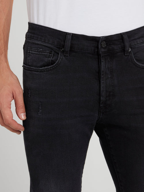 Выбеленные джинсы с рваной отделкой
