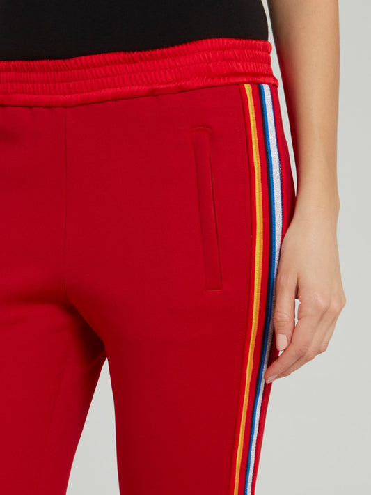 Красные спортивные брюки с лампасами