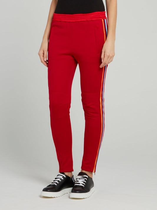 Красные спортивные брюки с лампасами