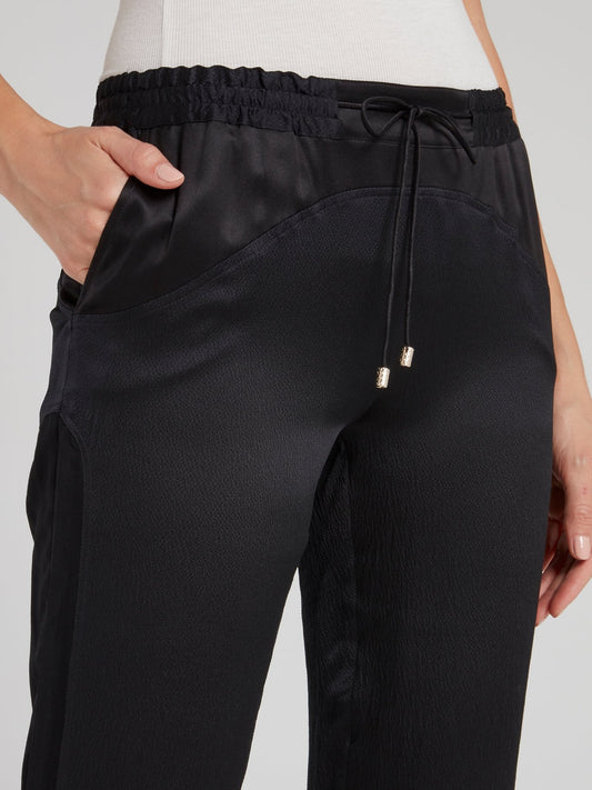 Черные прямые брюки из сатина со вставками