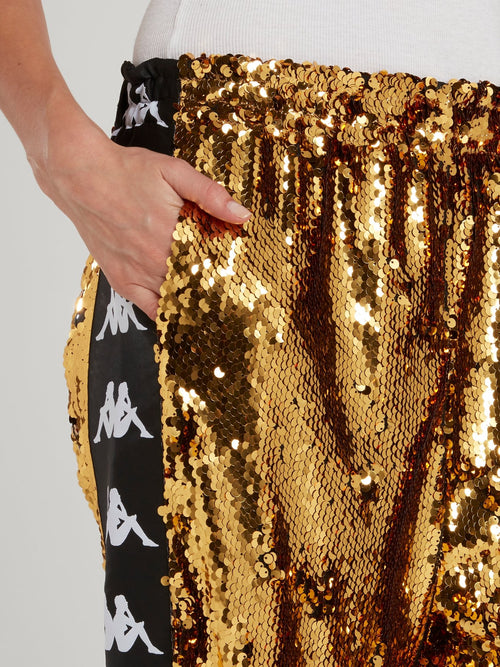 Золотые брюки с пайетками Kappa
