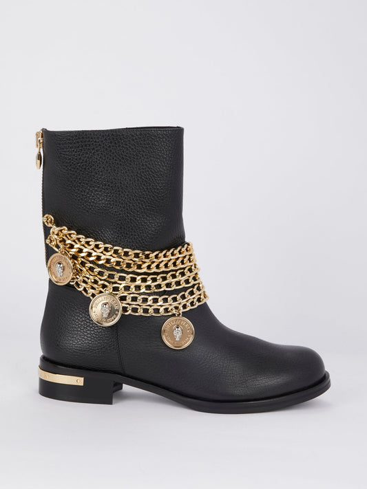 Черные кожаные ботинки с золотыми цепями