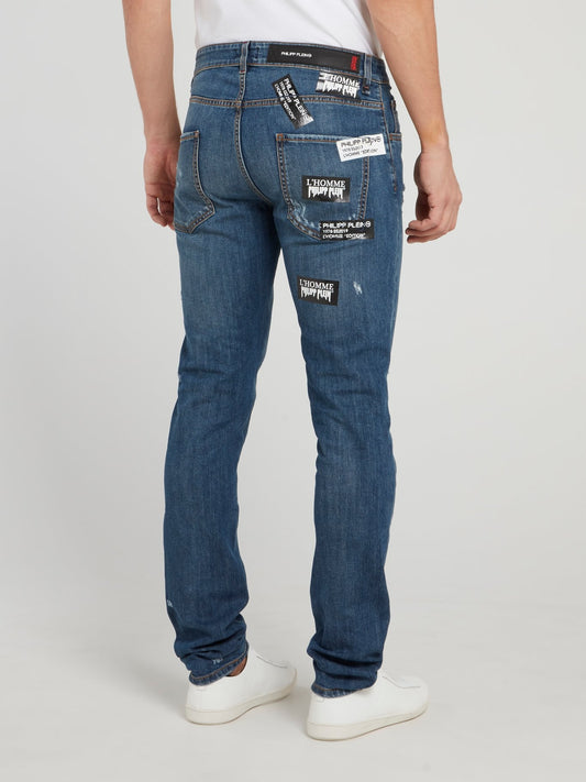 Прямые джинсы с рваной отделкой