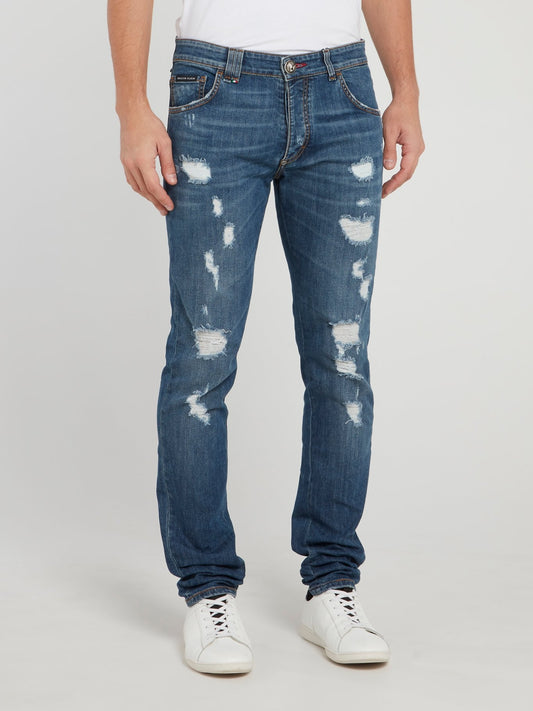 Прямые джинсы с рваной отделкой