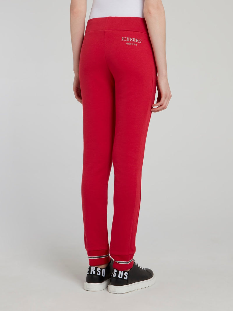 Красные спортивные брюки со шнурком и логотипом