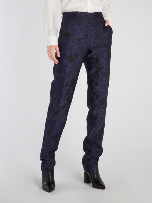 Темно-синие костюмные брюки с цветочным принтом