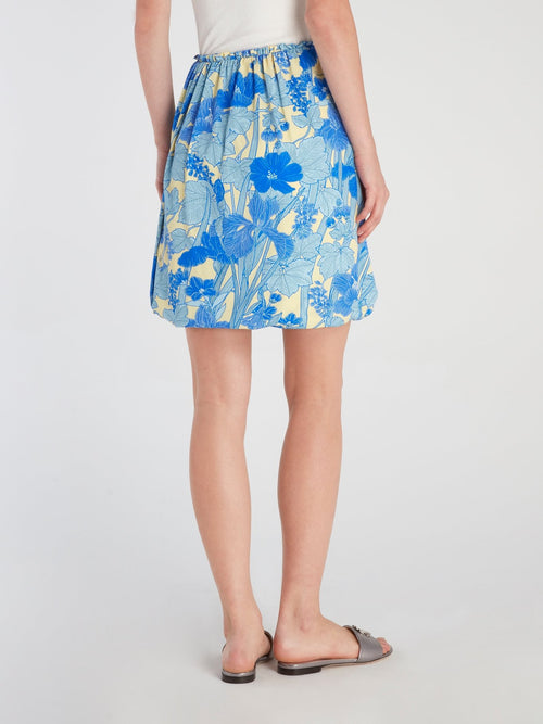 Синяя юбка-мини с тропическим принтом и оборками