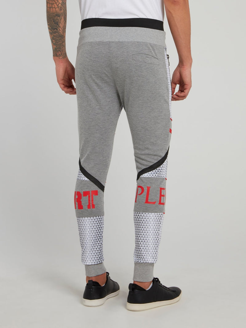 Серые спортивные брюки с геометрическим принтом Klaas