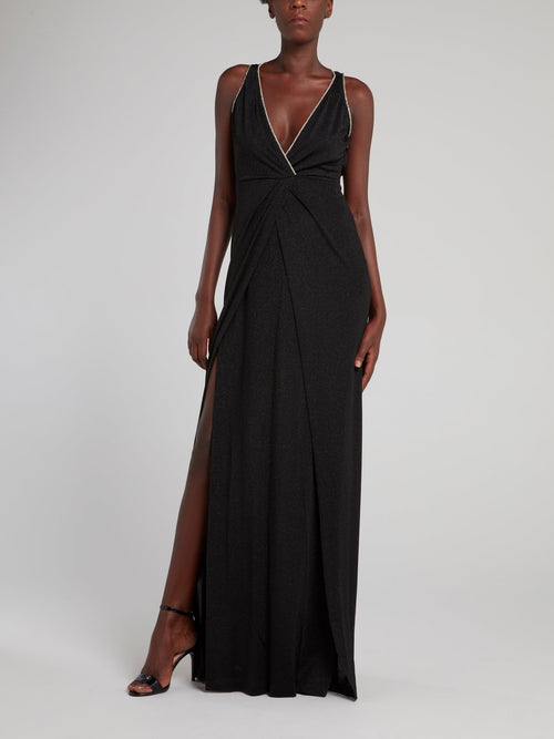 Черное блестящее платье-макси с разрезом