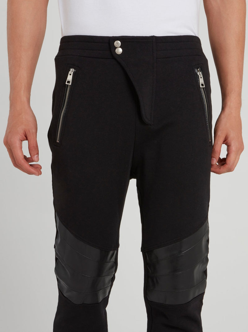 Черные кожаные брюки со вставками на коленях