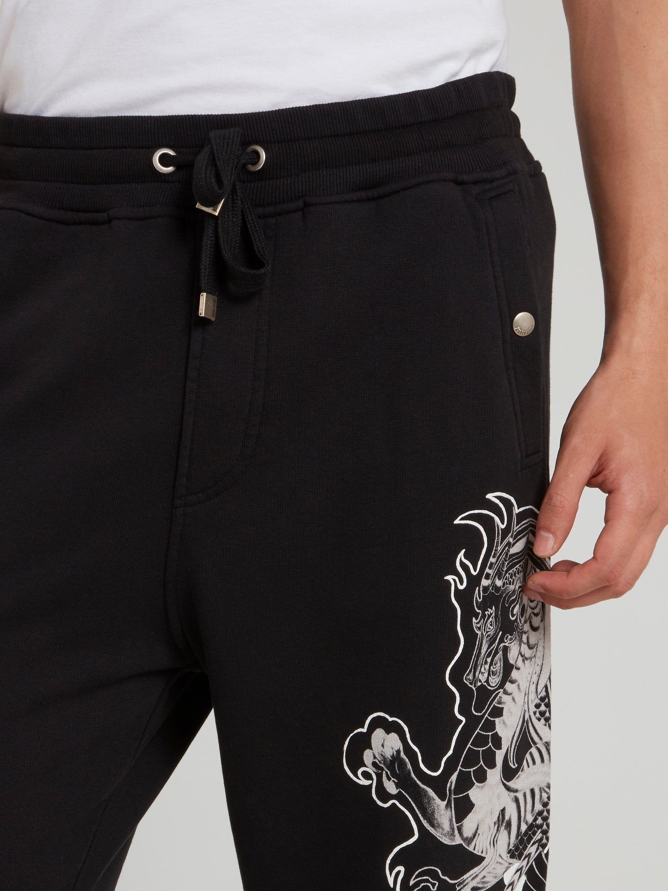 Черные брюки с изображением дракона