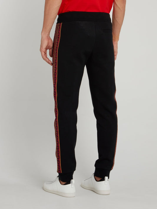 Черные брюки со вставками с эффектом змеиной кожи