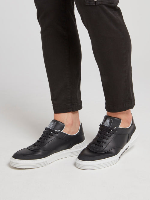 Черные низкие кожаные кроссовки