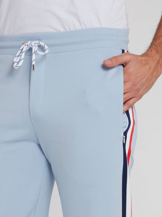 Голубые спортивные брюки из флиса с лампасами