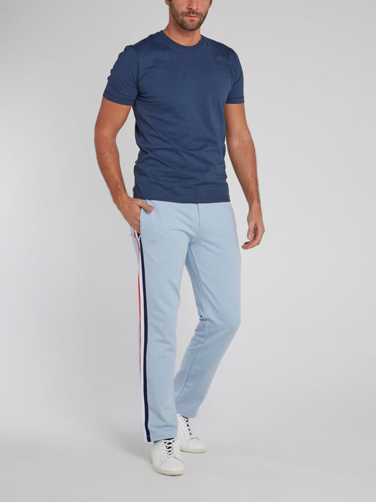 Голубые спортивные брюки из флиса с лампасами