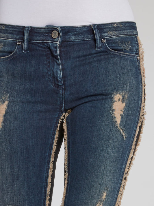 Укороченные джинсы с контрасной бахромой
